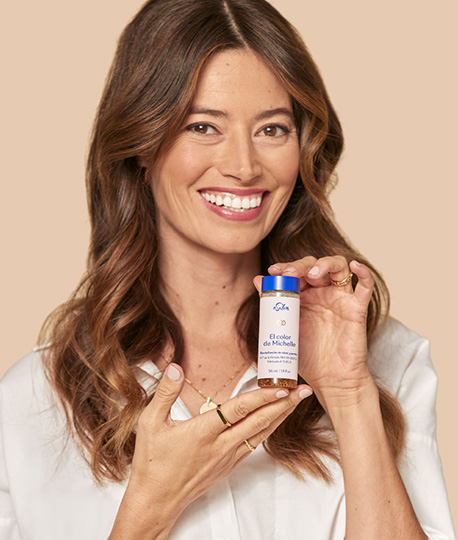 Brunette woman with personalized hair color bottle
